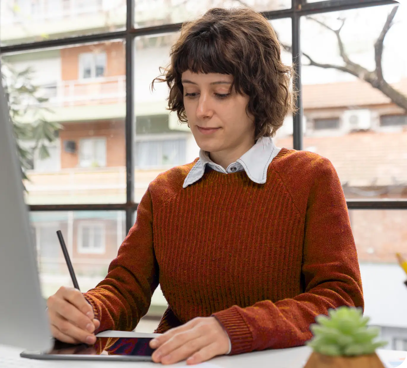 Coaching professional at their desk